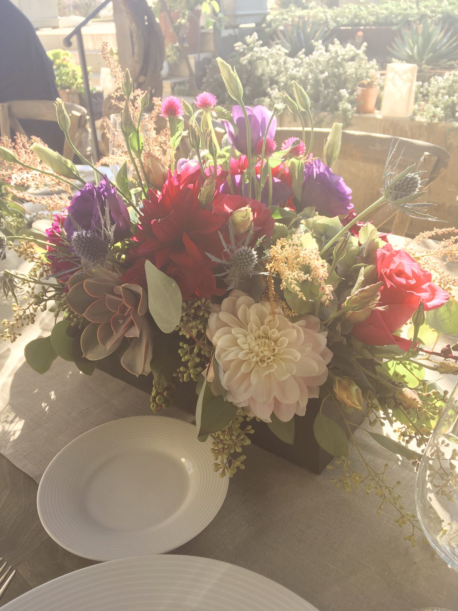 A glorious summery tablesetting for a late summer wedding in Bel Air featuring seasonal floral